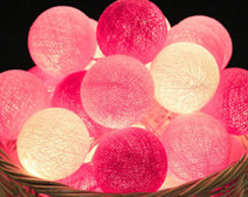 A set of 20 pink cotton ball string lights, battery powered, perfect for decoration.