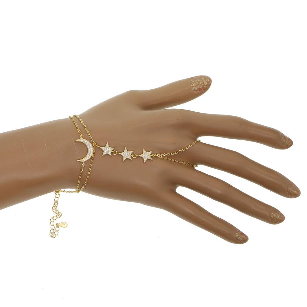 Elegant 100% 925 sterling silver gold filled micro pave cz moon star charm bracelet displayed on a soft fabric background.