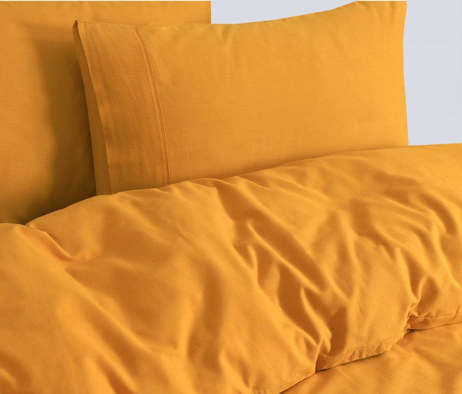 100% Egyptian Cotton Vintage Washed 500TC Mustard Double Quilt Cover with matching pillowcases, showcasing a soft and elegant design.