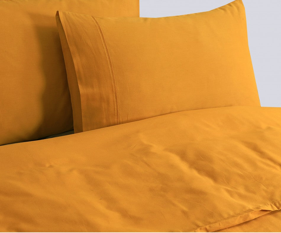 100% Egyptian Cotton Vintage Washed 500TC Mustard Double Quilt Cover with matching pillowcases, showcasing a soft and elegant design.