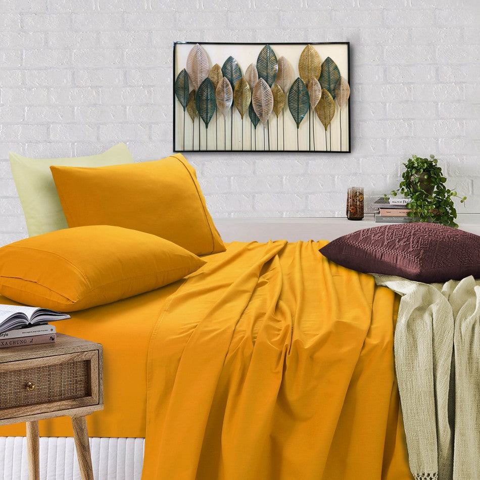 100% Egyptian Cotton Vintage Washed 500TC Mustard King Bed Sheets Set displayed on a bed, showcasing its luxurious texture and elegant design.