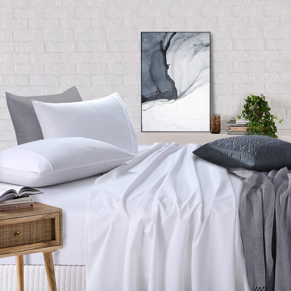 Luxurious 100% Egyptian Cotton Vintage Washed 500TC White King Single Bed Sheets displayed elegantly on a bed.