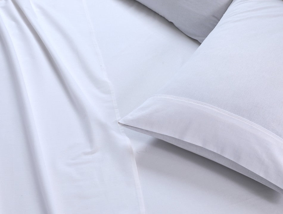 Luxurious 100% Egyptian Cotton Vintage Washed 500TC White King Single Bed Sheets displayed elegantly on a bed.
