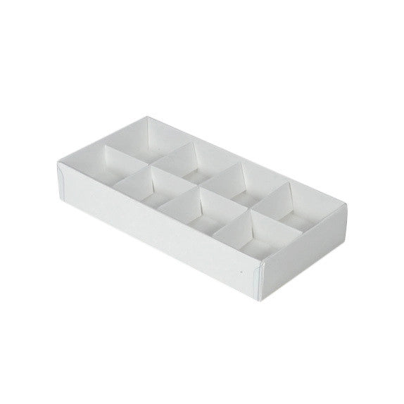A set of 10 elegant white gift boxes with clear plastic lids, designed for chocolates and petite gifts, showcasing their compartmentalized structure.
