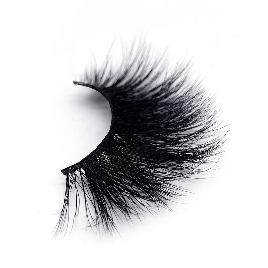 A pair of luxurious 100% real mink eyelashes, 25MM in length, showcasing a soft and natural look, perfect for enhancing beauty.