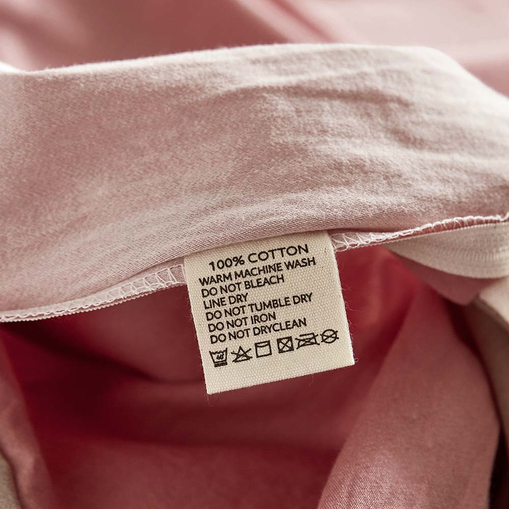 Cosy Club 100% Washed Cotton Sheet Set in pink and brown, showcasing a soft and breathable fabric ideal for year-round comfort.