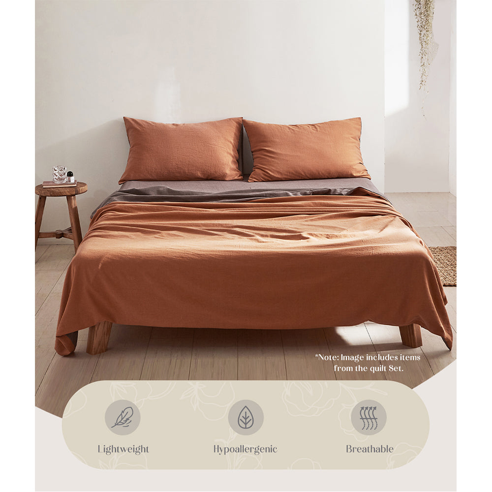 Cosy Club 100% Washed Cotton Sheet Set in Orange Brown, showcasing a soft and breathable fabric ideal for year-round comfort.