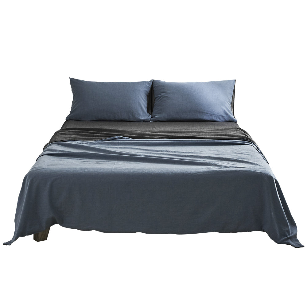 100% washed cotton sheet set in blue and dark grey, featuring a soft texture and lightweight design, perfect for year-round comfort.