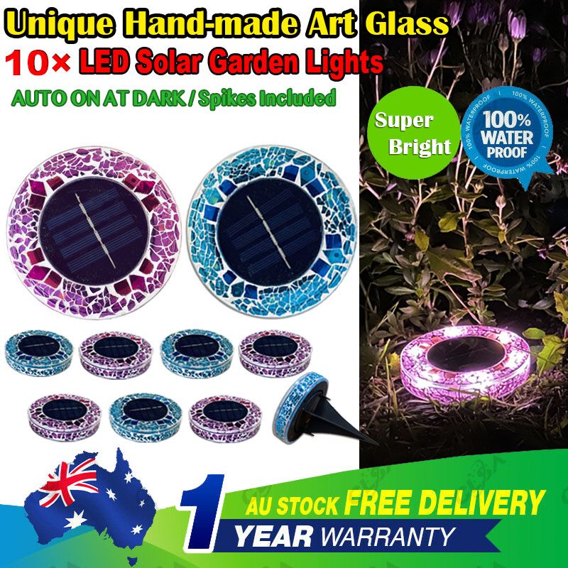 A set of 10 solar LED hand-made art stained glass inground lights, showcasing vibrant red stained glass designs, perfect for garden illumination.