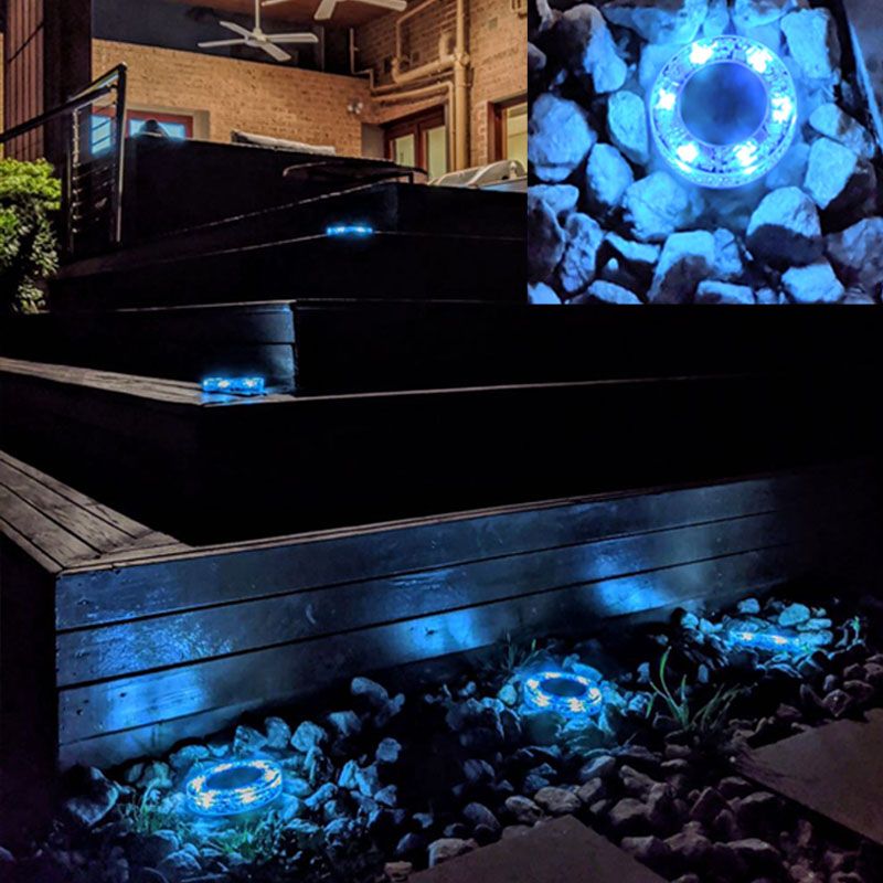 A set of 10 solar LED hand-made art stained glass inground lights, showcasing vibrant red stained glass designs, perfect for garden illumination.