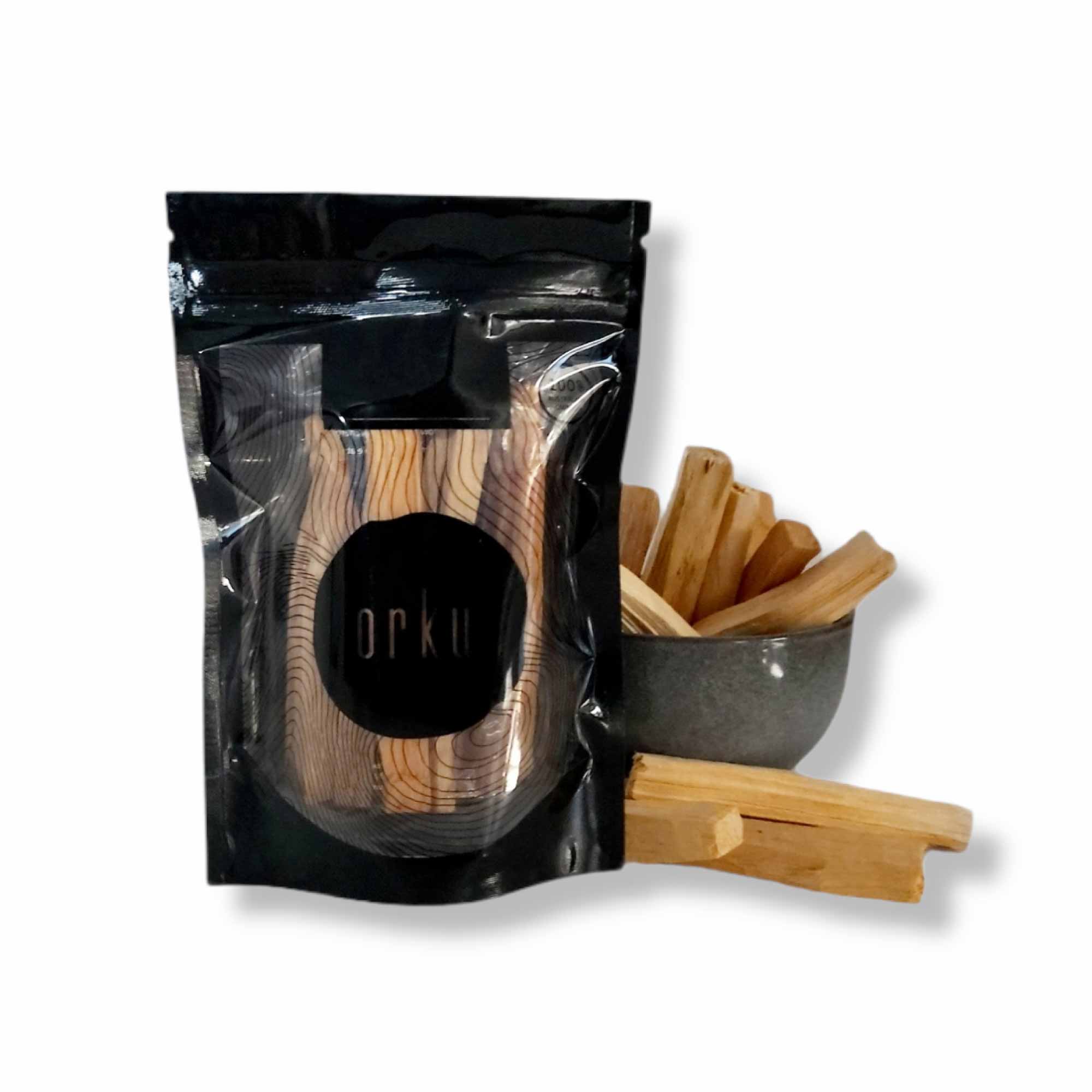 100g pack of Palo Santo smudge sticks, sustainably sourced from Peru, featuring a fresh aroma and natural wood texture.