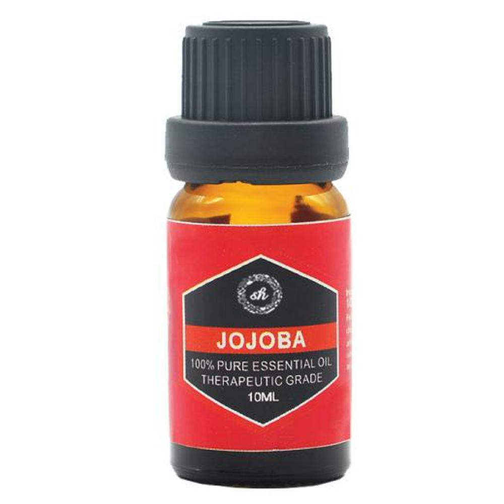 A collection of 10ml essential oil bottles in various scents, including lavender and peppermint, displayed in an elegant arrangement.