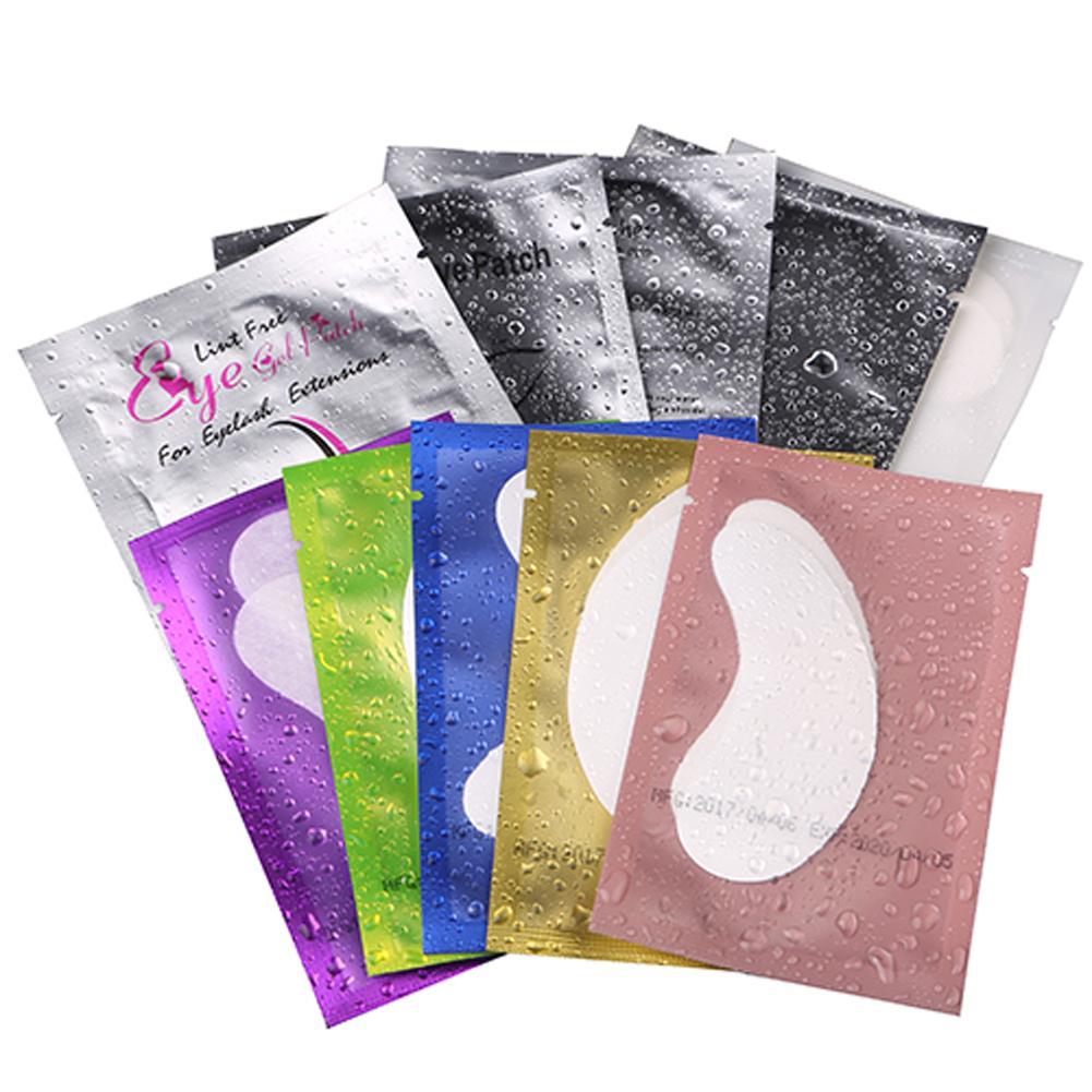 A pack of 100 pairs of eyelash extension paper patches in various colors, designed for professional eyelash application.