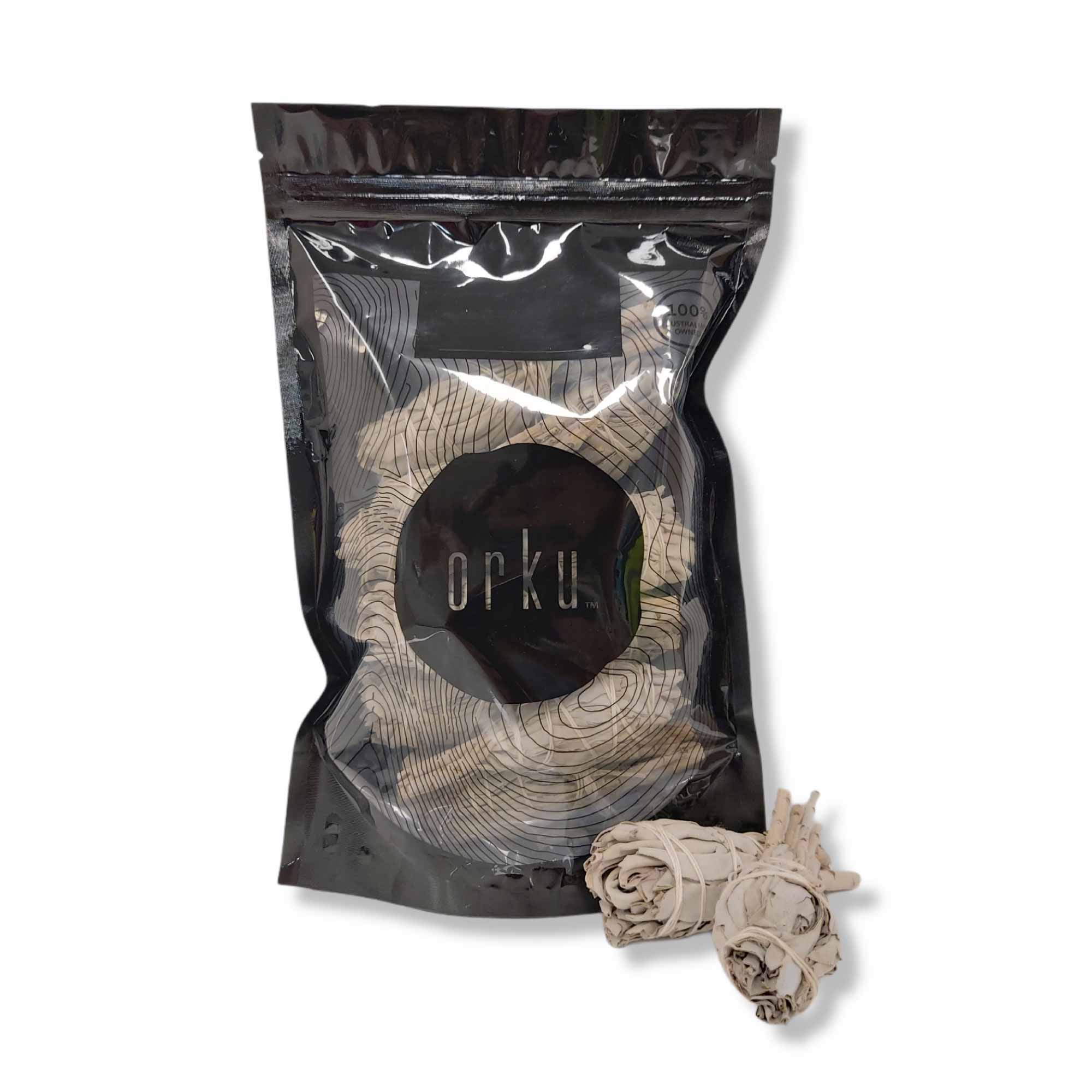 A pack of 10 mini Californian white sage smudge sticks, each wrapped in cotton string, showcasing their organic and natural appearance.