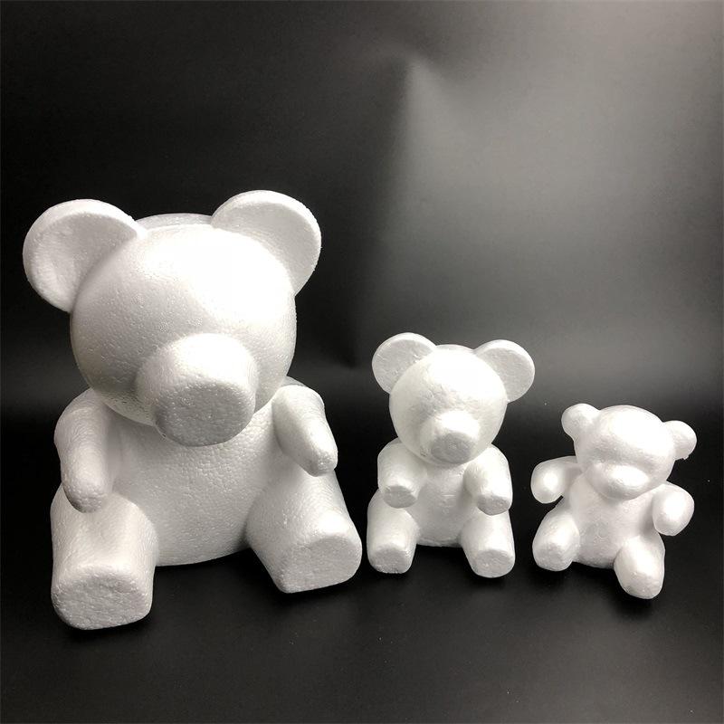 A collection of white polystyrene foam love bear crafts in various sizes, perfect for DIY projects and Valentine's gifts.