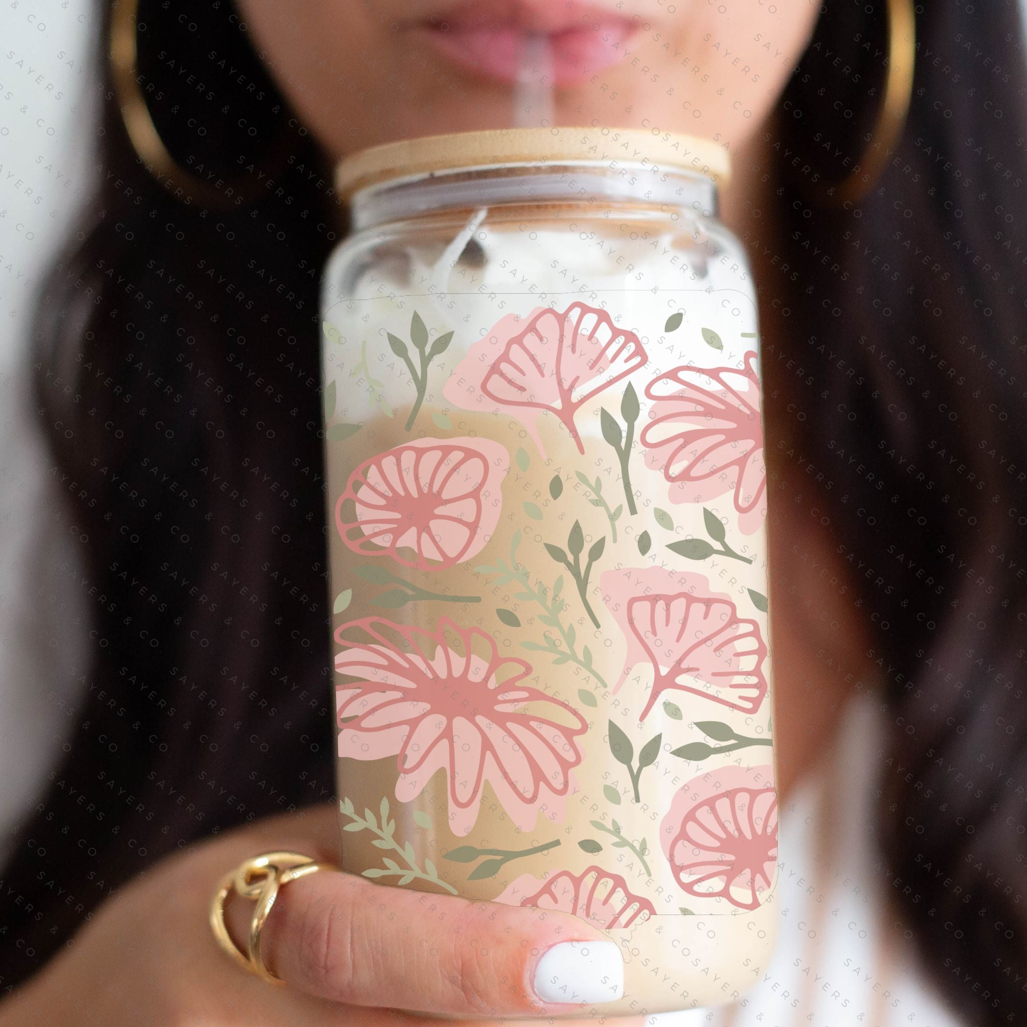 16oz Spring Full Bloom Glass Cup with Bamboo Lid and Straw, featuring a vibrant floral design perfect for spring beverages.