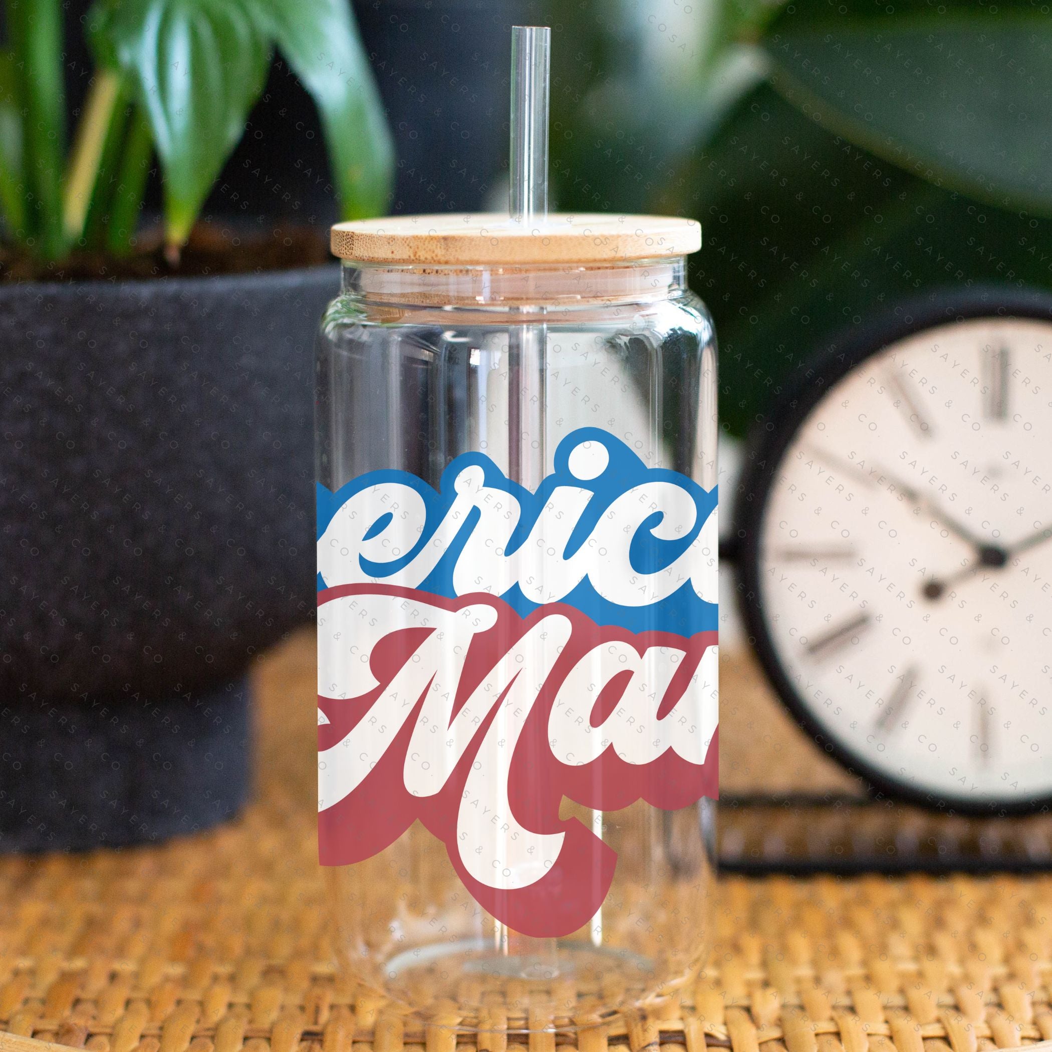 16oz Summer American Mama Patriotic Glass Cup featuring a bamboo lid and straw, perfect for summer drinks.