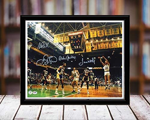 Framed print of the 1980 Boston Celtics vs LA Lakers game featuring a printed autograph, displayed in a sleek black metal frame.