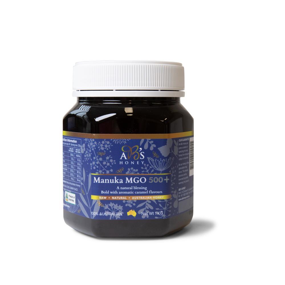 1Kg jar of AB's MGO 500+ Australian Manuka Honey, showcasing its rich dark color and natural packaging.