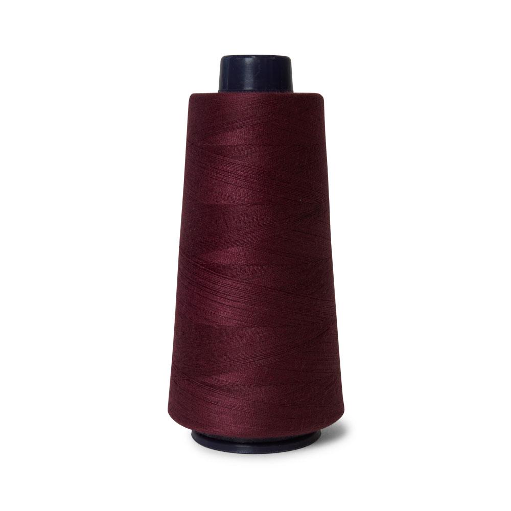 A 2000m spool of wine red sewing overlocker thread by Hemline, showcasing its vibrant color and high-quality polyester material.