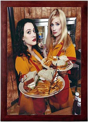 A high-quality 12x18 inch print of 2 Broke Girls featuring a printed autograph, displayed in a sleek black frame.