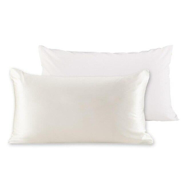 Luxurious 22 momme mulberry silk pillowcase with a cotton underside, featuring a hidden zipper closure, available in various colors.