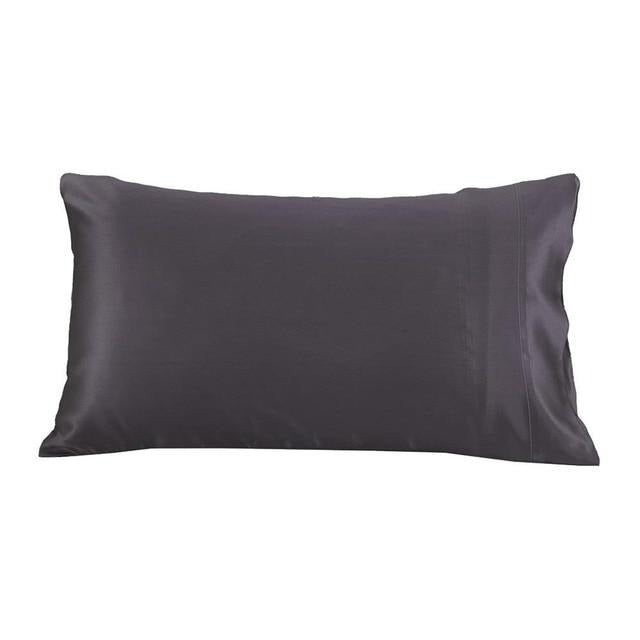 Luxurious 22 momme mulberry silk pillowcase with a cotton underside, featuring a hidden zipper closure, available in various colors.