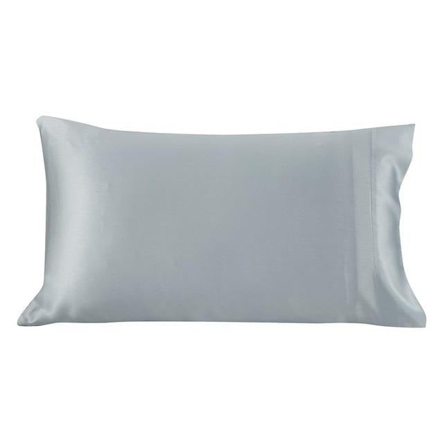 Luxurious 22 momme mulberry silk pillowcase with a cotton underside, featuring a hidden zipper closure, available in various colors.