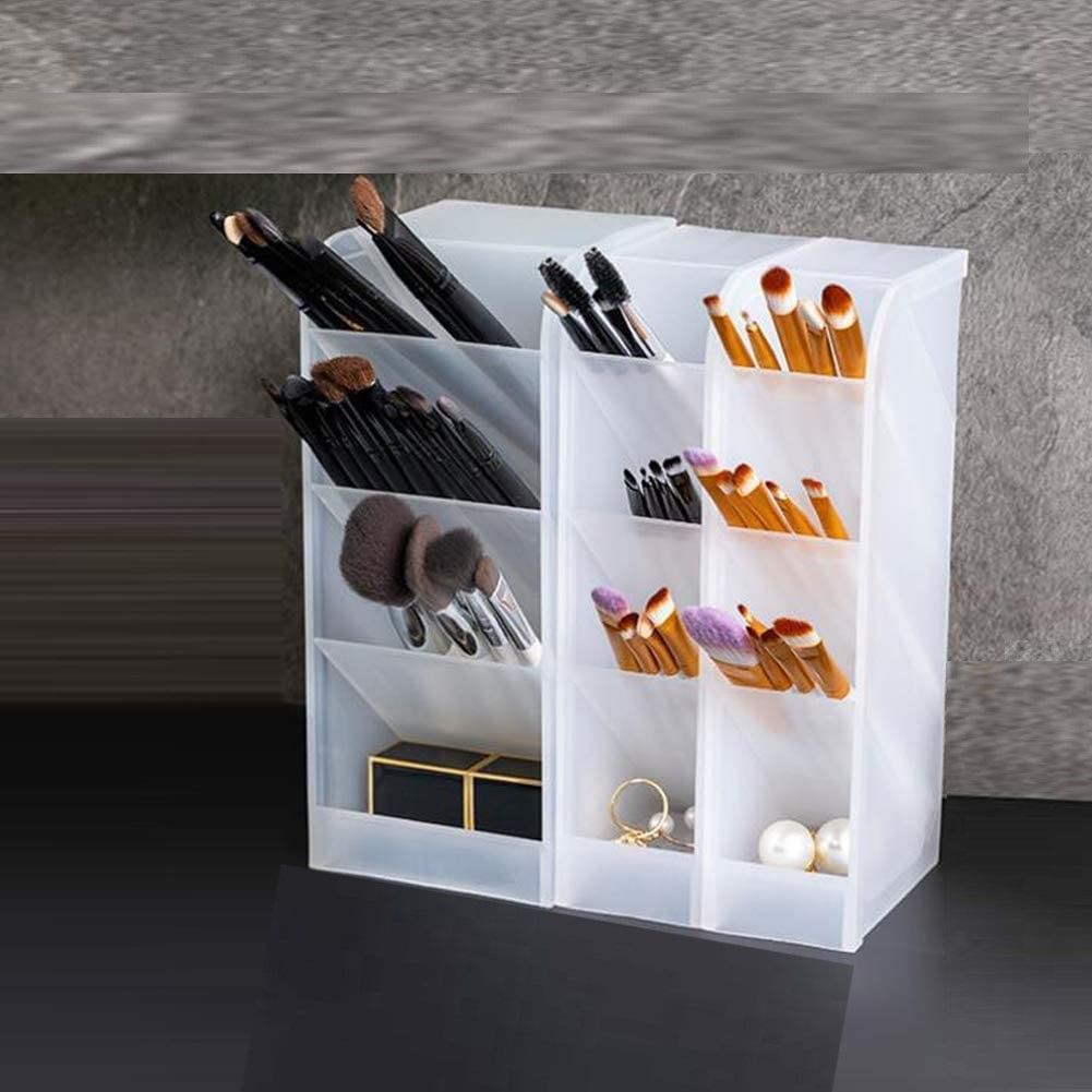 Two trapezoidal desktop storage units in clear colors, ideal for organizing office and school supplies.