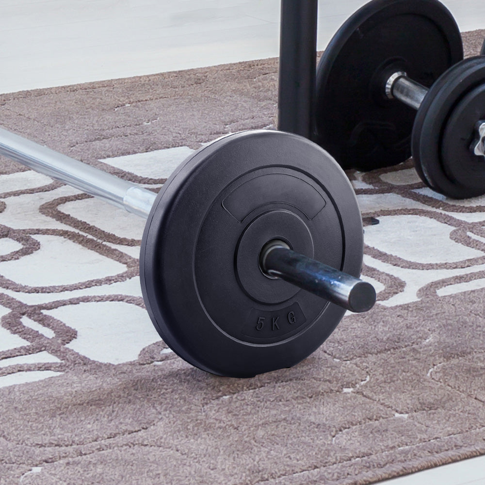 Two 5KG barbell weight plates with a rubber surface, designed for home gym workouts, showcasing their sturdy build and standard size.