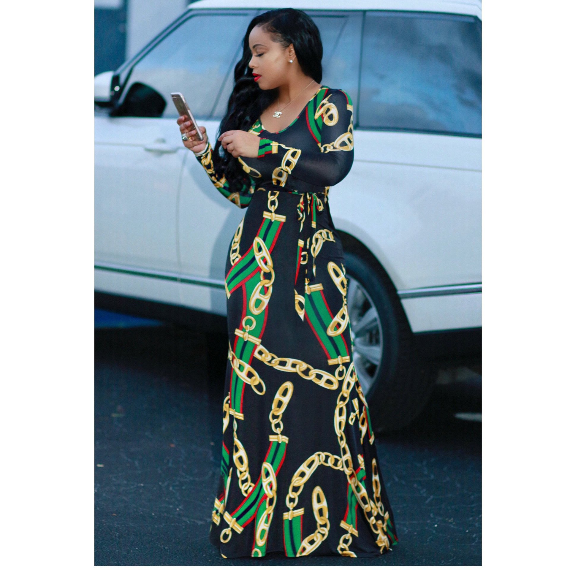 2017 Autumn Women's Maxi Dress featuring traditional African print, showcasing elegant A-line silhouette and cap sleeves.