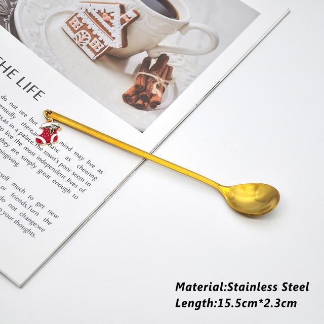 A beautifully designed Creative Metal Merry Christmas Spoon in gold with a Christmas pendant, perfect for holiday celebrations.