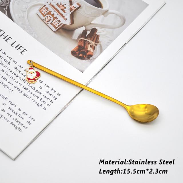 A beautifully designed Creative Metal Merry Christmas Spoon in gold with a Christmas pendant, perfect for holiday celebrations.