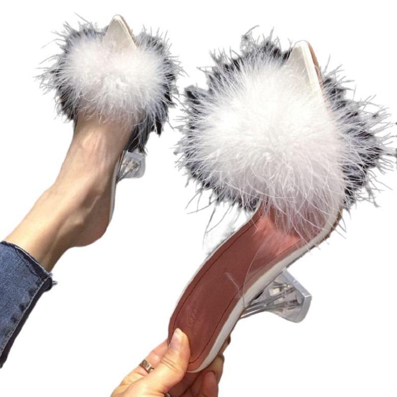 2021 Women Fluffy Ball Pointed Toes High Heel featuring a fuzzy ball detail, stylish and trendy design suitable for various occasions.