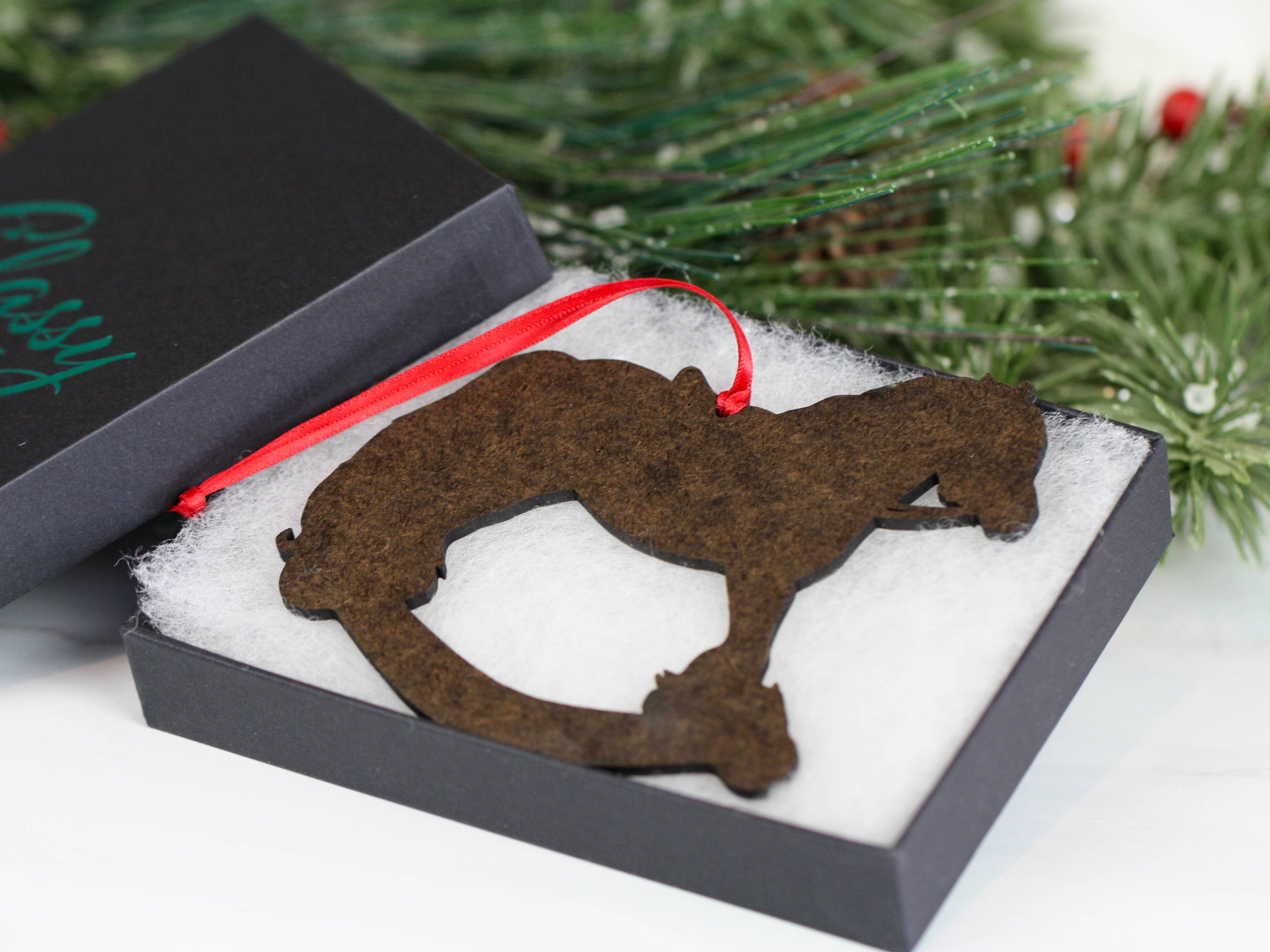 2023 Spotted Gypsy Cob Rocking Horse Christmas Ornament, handmade from composite wood with a glossy finish, featuring red and black ribbons.