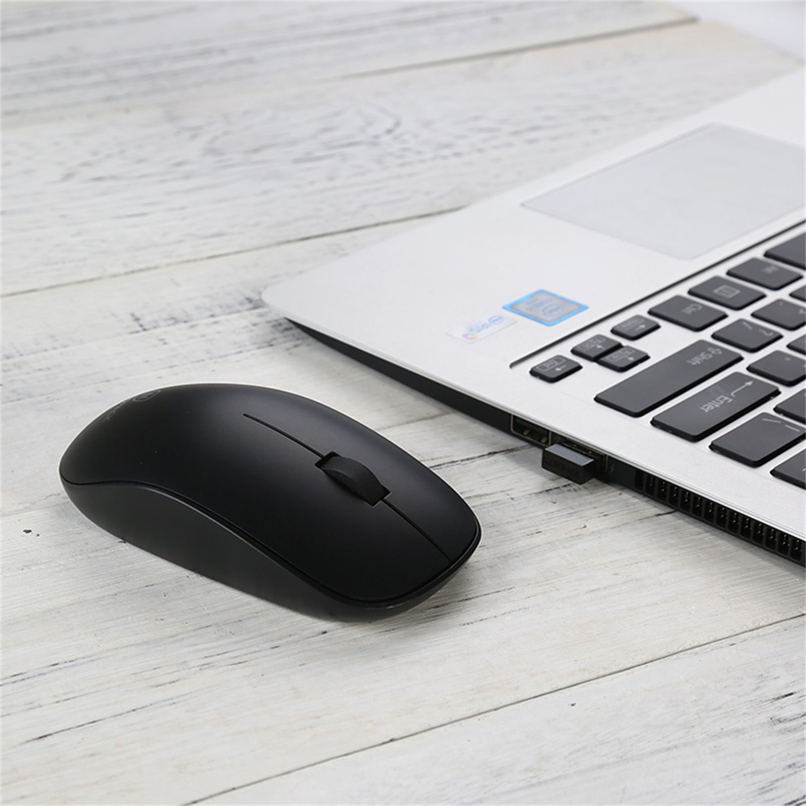 Black 2.4G Wireless Mouse with USB receiver, ergonomic design, and slim profile for comfortable use.