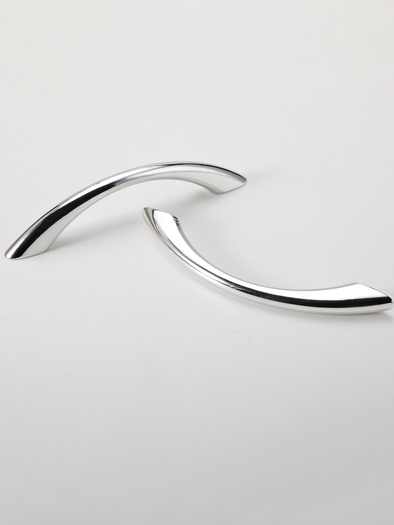 Two silver plastic handles designed for furniture, showcasing a sleek and modern aesthetic.