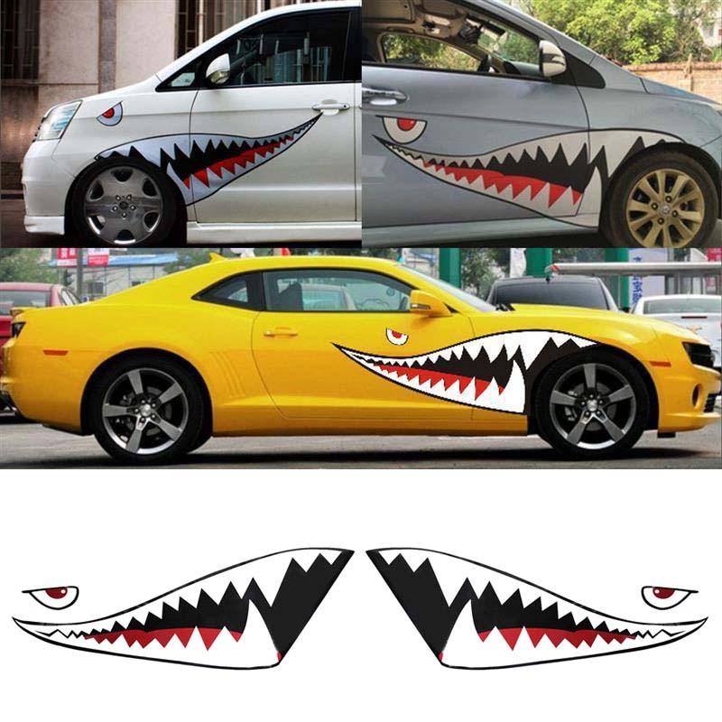 Two DIY shark mouth tooth PVC car stickers with red and black eyes, designed for vehicle decoration.