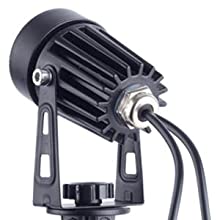 Three LED solar spotlights with a black finish, designed for outdoor use, showcasing their waterproof features and bright warm white light.