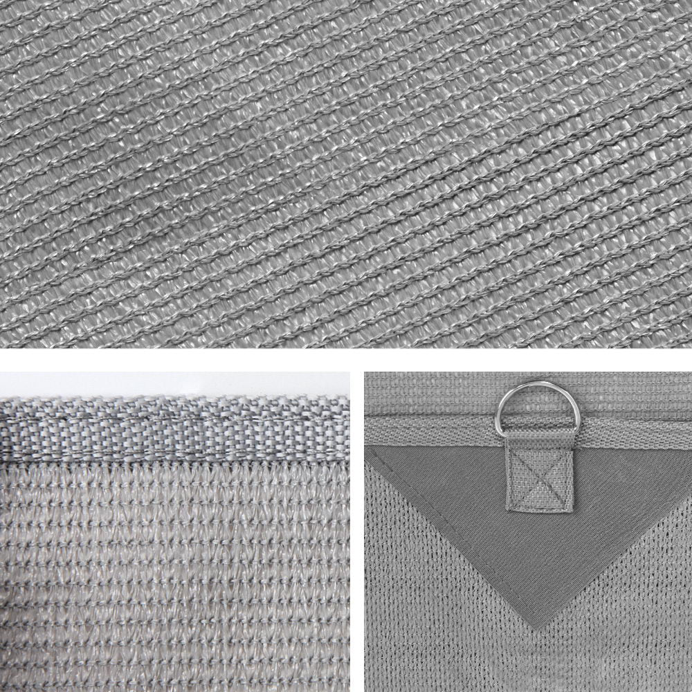 3.4M Caravan Privacy Screen attached to a caravan awning, showcasing its grey water-repellent fabric and stainless steel D-rings.