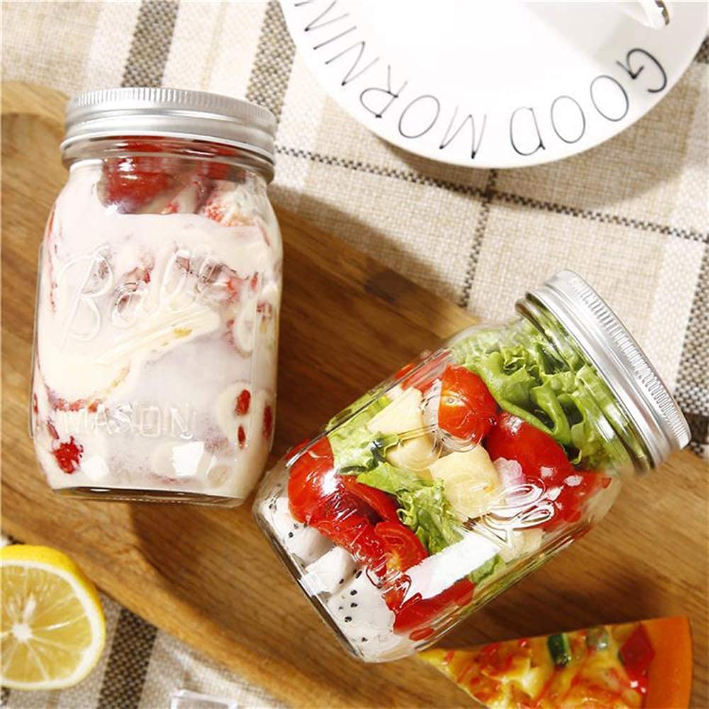 Four 480ml glass mason jars with airtight lids, ideal for storing spices and preserves, arranged neatly on a kitchen countertop.