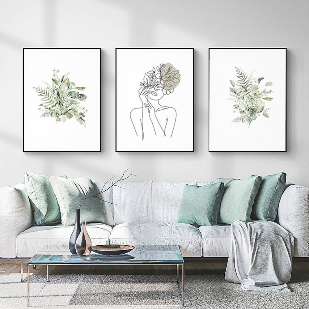Three sets of 40cmx60cm Botanical Line Girl canvas wall art in elegant black frames, showcasing modern design and premium quality.