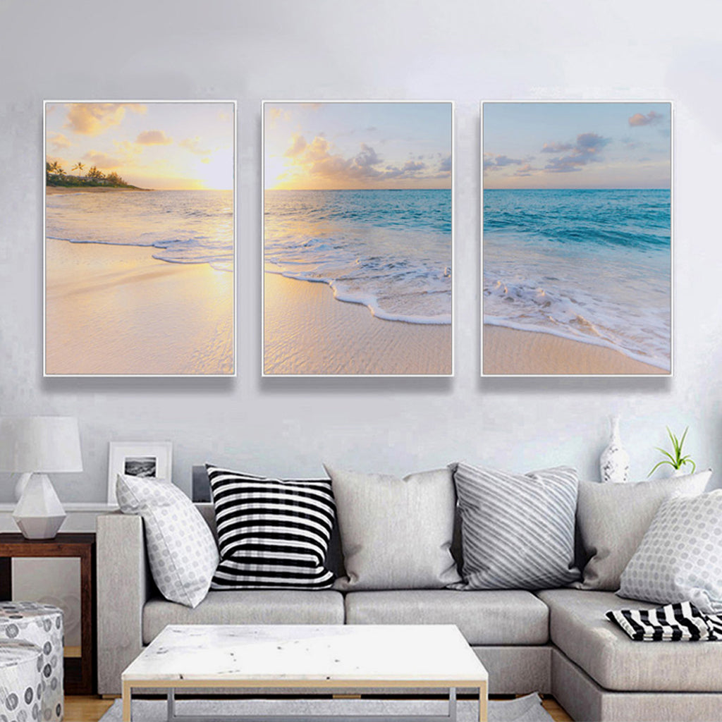 Three-piece canvas wall art set featuring ocean and beach scenes, framed in a stylish white floating frame.