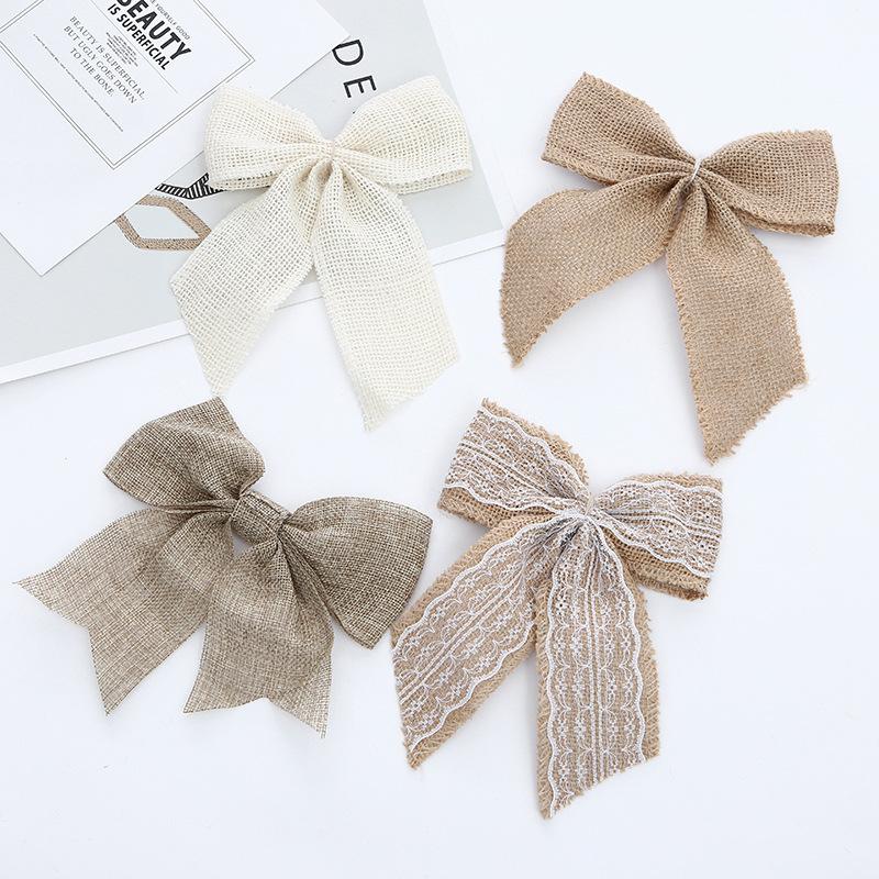 Set of 4 rustic Christmas bows in festive colors, perfect for holiday and wedding decorations.