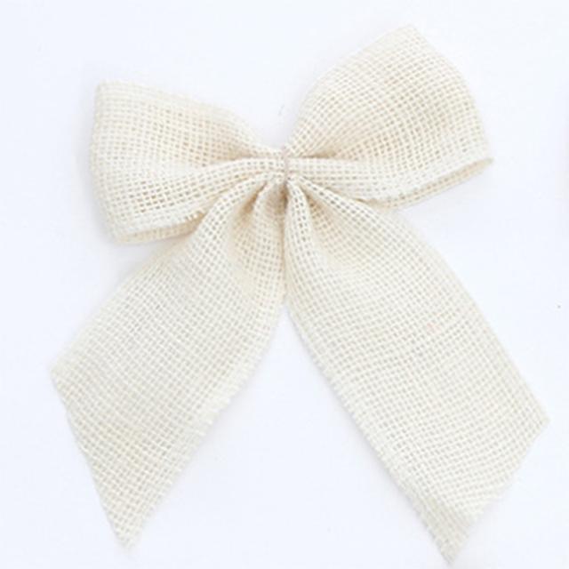 Set of 4 rustic Christmas bows in festive colors, perfect for holiday and wedding decorations.