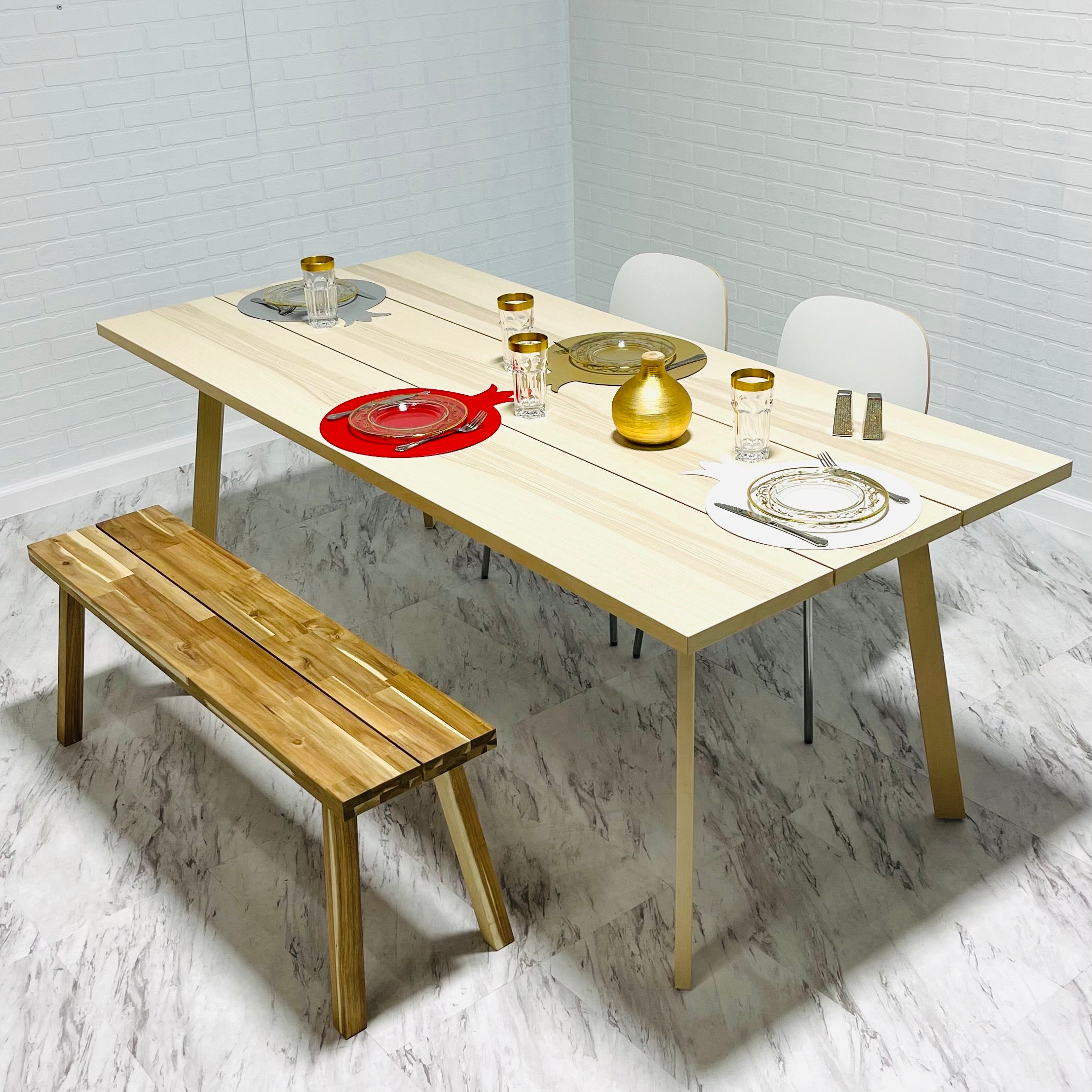 A set of six pomegranate-shaped placemats made from smooth faux leather in vibrant colors, perfect for festive dining.