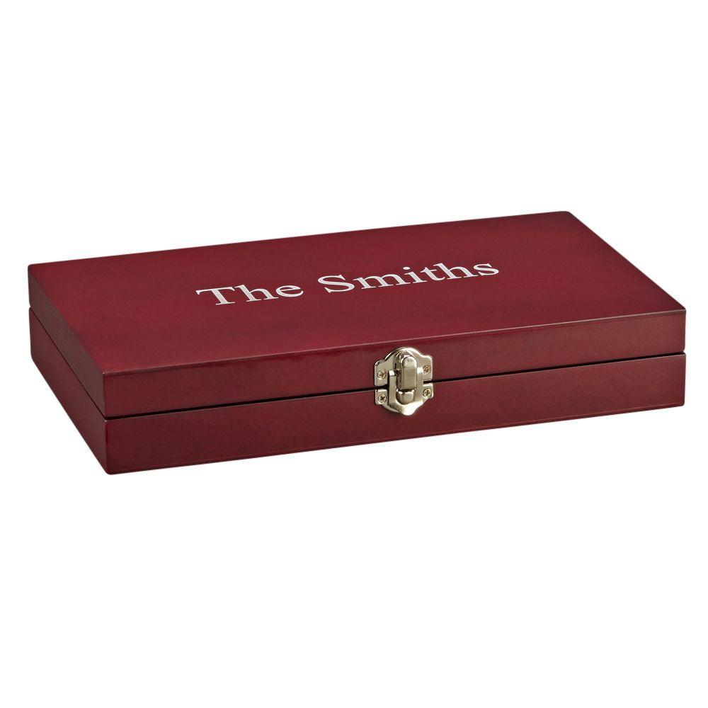 A 6 Piece Steak Knife Set displayed in a hinged rosewood case, showcasing stainless steel serrated knives.