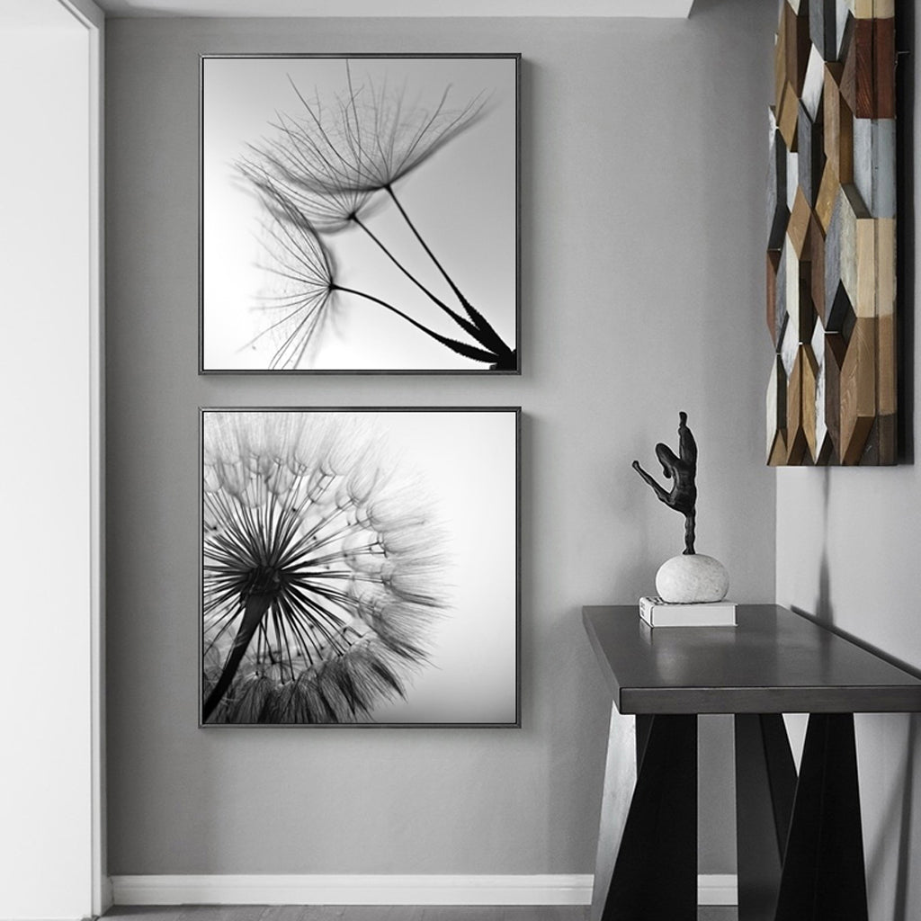 A beautifully framed black and white dandelion canvas wall art set, showcasing intricate details and a modern floating frame design.
