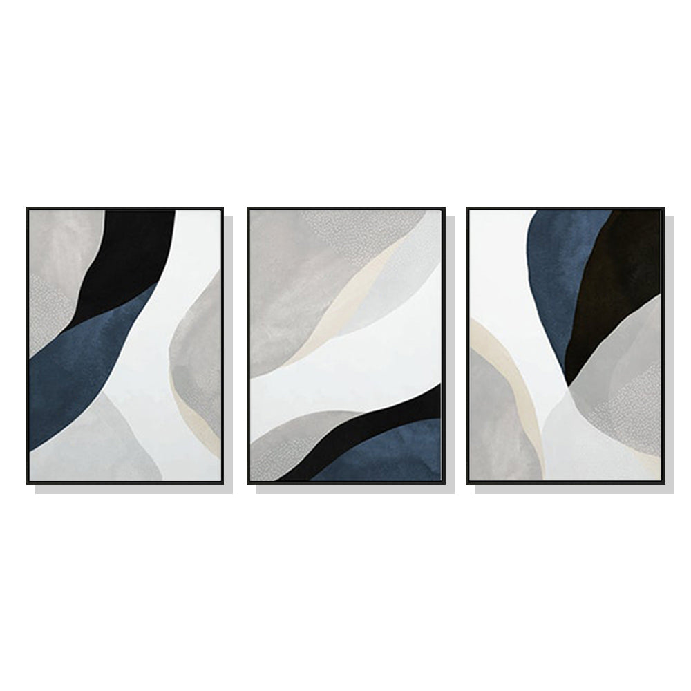 Three-piece abstract navy blue canvas wall art set with black frames, elegantly displayed on a wall.