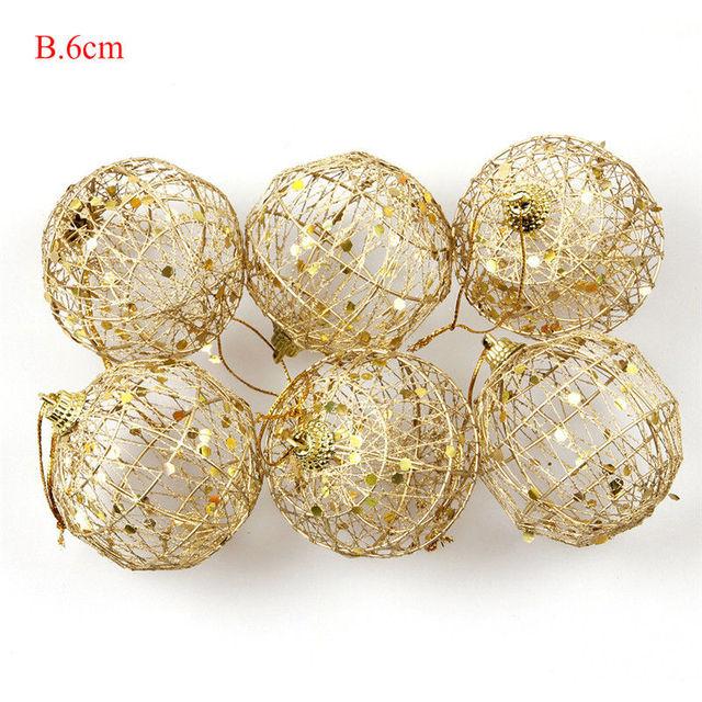 A set of six golden scaled Christmas baubles, featuring a luxurious design perfect for holiday decorations.